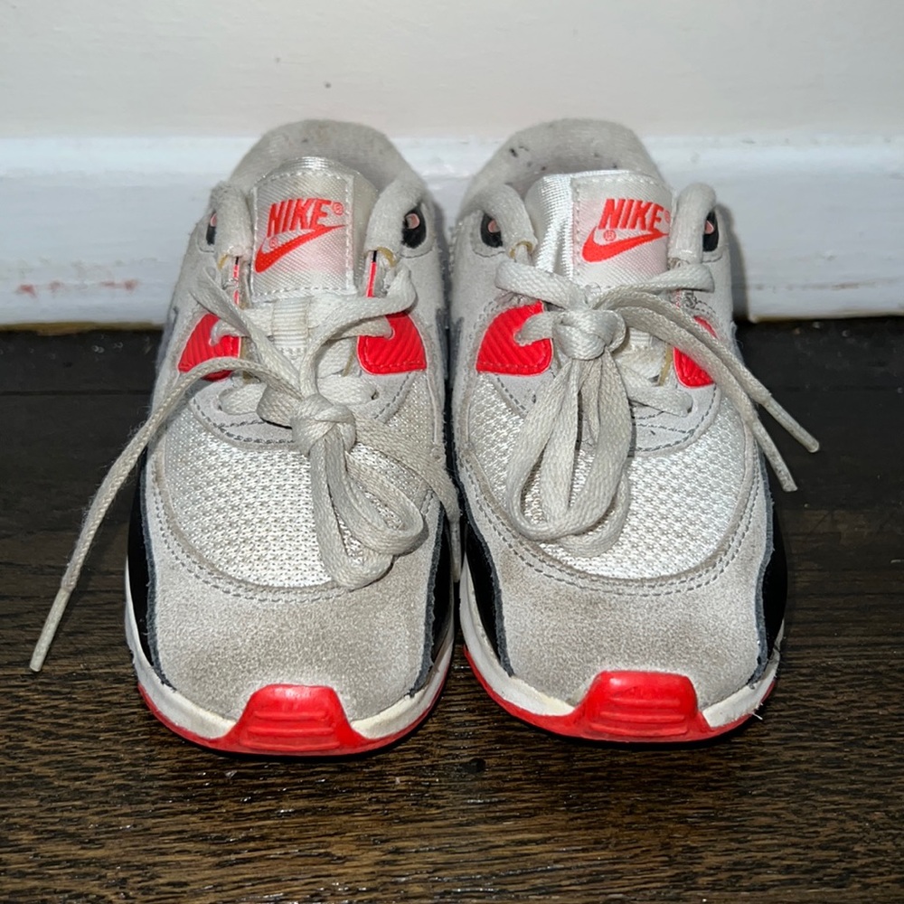 Orange, black, and white air max